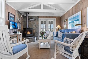 Smart TV, fireplace, DVD player, books