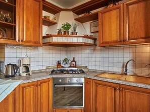 Fridge, microwave, oven, cookware/dishes/utensils