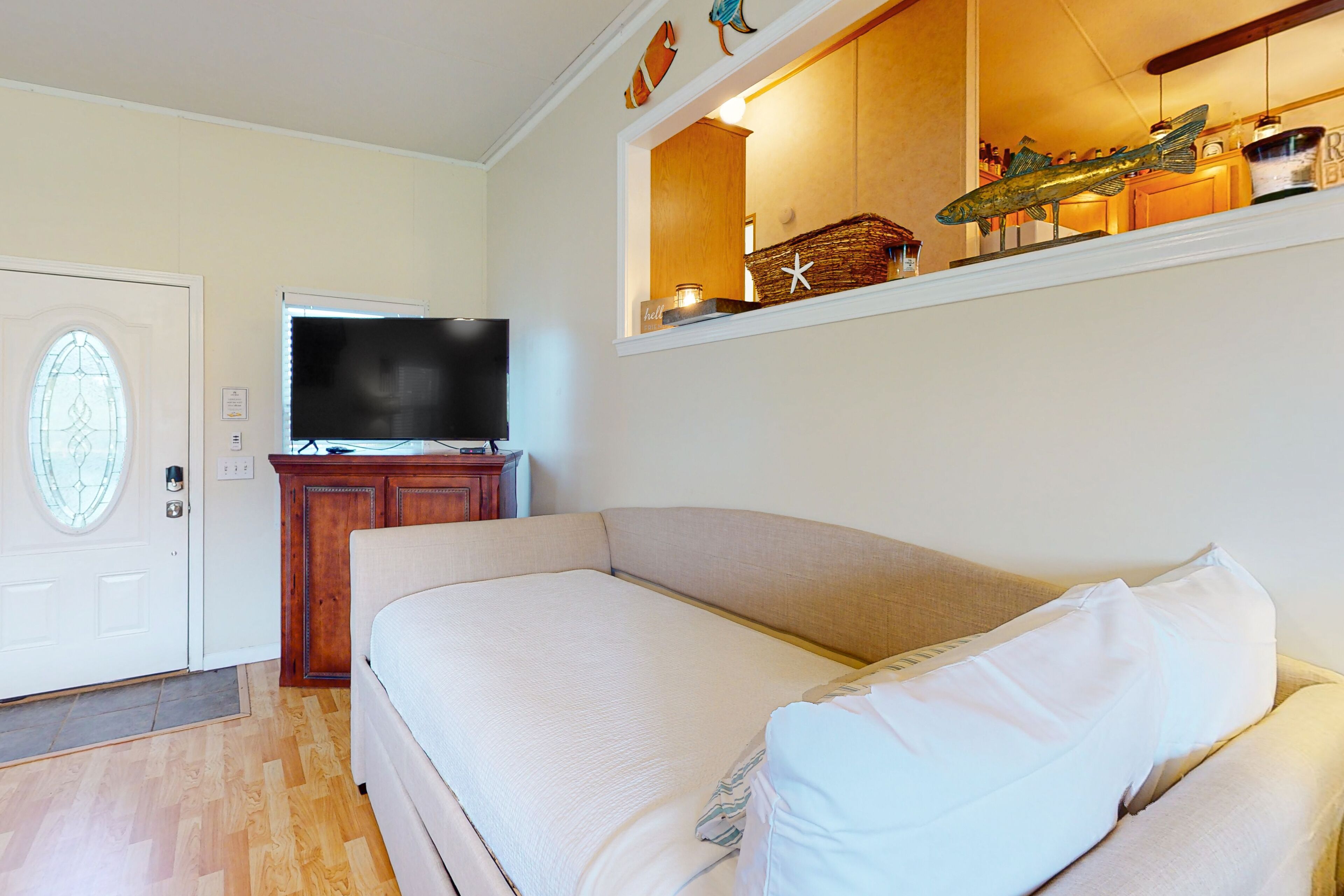 Dog-friendly coastal home with close beach access, pool, hot tub, gym, & grill