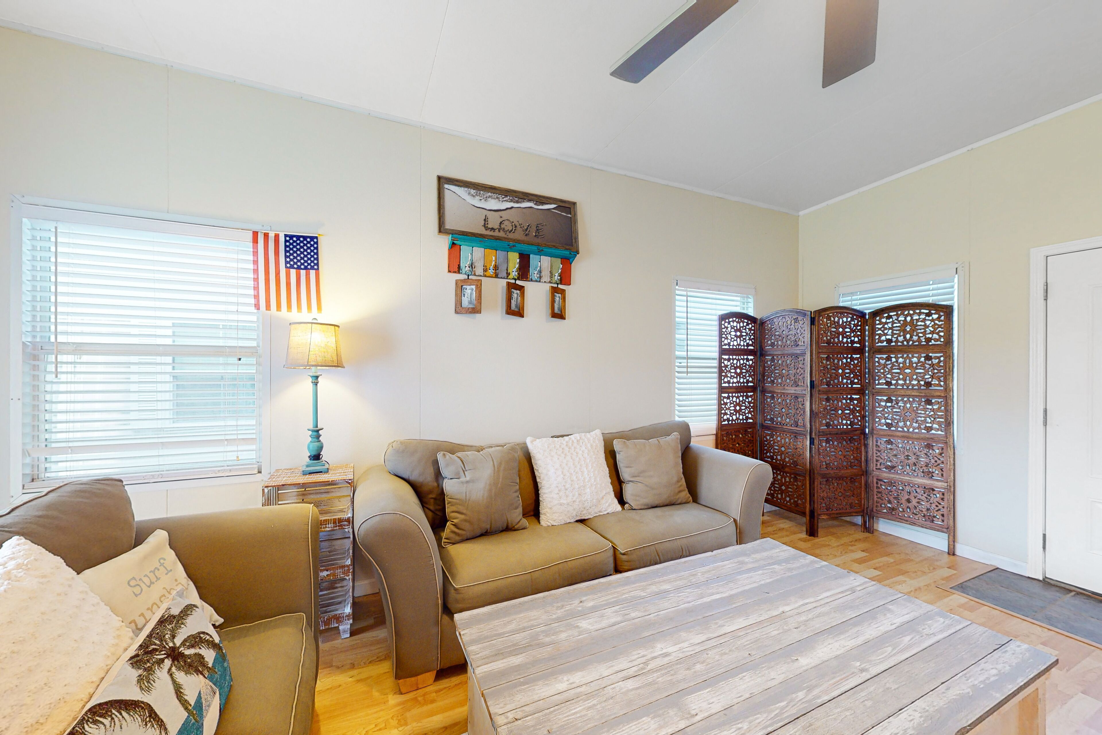 Dog-friendly coastal home with close beach access, pool, hot tub, gym, & grill