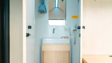 Shower, rainfall showerhead, towels