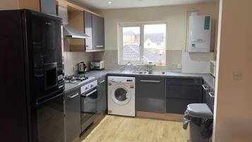 Apartment | Private kitchen | Fridge, microwave, oven, stovetop