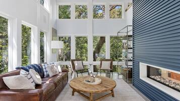 Smart TV, fireplace, books, offices