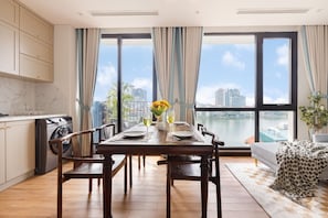 Signature Apartment | Living area | Flat-screen TV