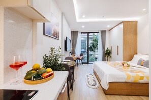 Signature Studio | Desk, laptop workspace, soundproofing, iron/ironing board - Margaery Boutique Apartment (Hanoi)
