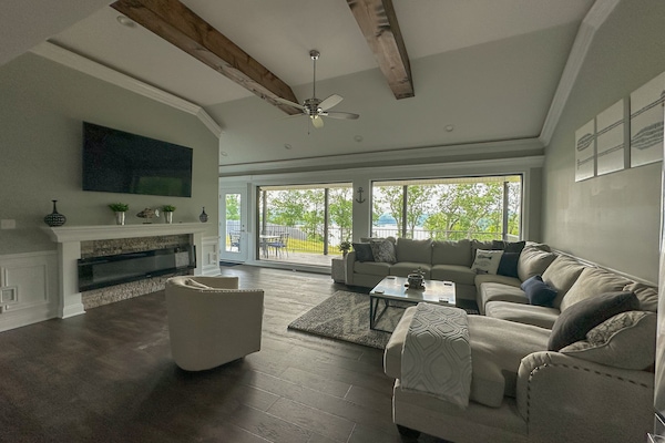 The living room, which includes an awesome view, has an entry way onto the deck!