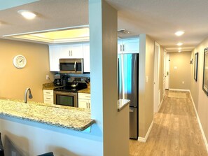 Fridge, microwave, oven, stovetop - The Villas A-7 - Premium 2 Bedroom 2 Bath Oceanfront Condo (Clearwater)