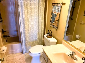 Bathtub, hair dryer, towels