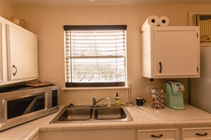 Fridge, microwave, oven, stovetop - Vacation Home Located on the Frio River (Concan)