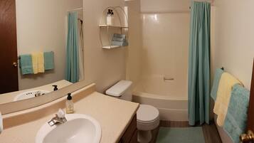 Hair dryer, towels, soap, shampoo