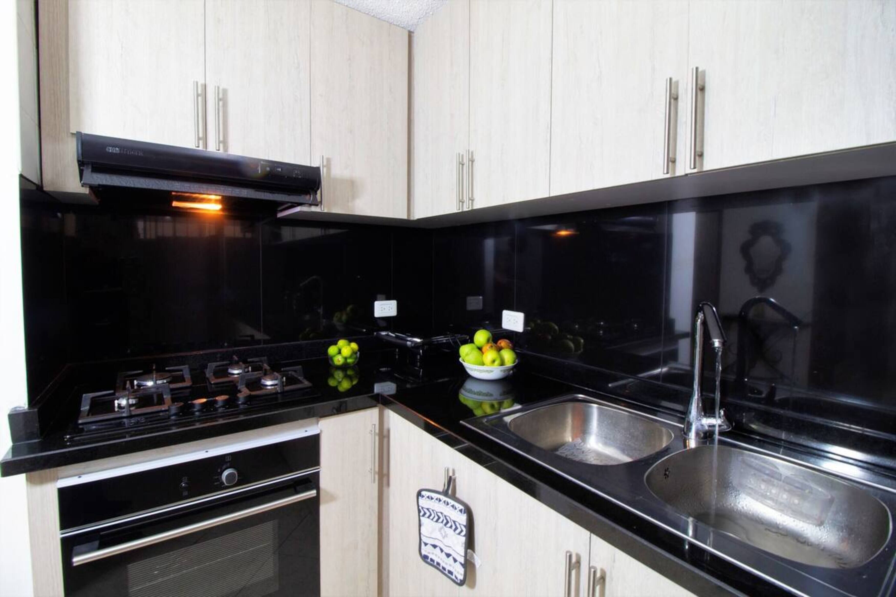 Apartment, 3 Bedrooms | Private kitchen | Full-size fridge, microwave, oven, stovetop