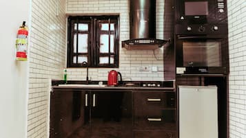 Full-sized fridge, microwave, oven, dishwasher