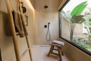 Shower, free toiletries, hair dryer, slippers