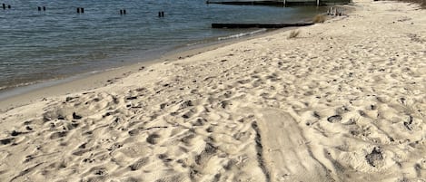 On the beach, sun-loungers, beach towels