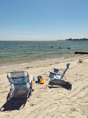On the beach, sun loungers, beach towels