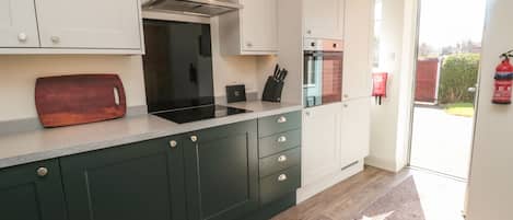 Fridge, electric kettle, toaster, cookware/dishes/utensils