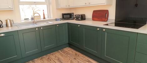 Fridge, electric kettle, toaster, cookware/dishes/utensils