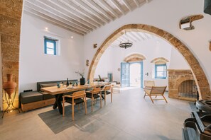 Traditional Villa | Living area | 55-inch flat-screen TV with satellite channels - Kalathos Square Luxury Suites (Rhodes)