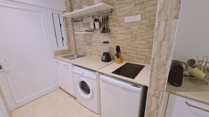 Fridge, electric kettle, toaster, cookware/dishes/utensils
