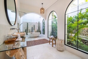 Bathtub, hair dryer, towels