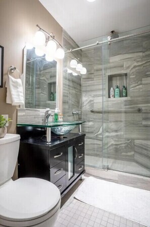 Shower, towels, soap, shampoo