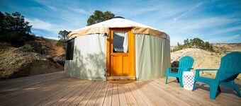 Luxury Glamping Yurt Resort Between National Parks with desert mountain views, close to hiking trails, slot canyons, off-roading and more!