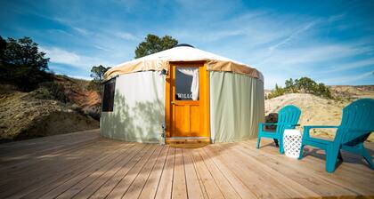 Luxury Glamping Yurt Resort Between National Parks with desert mountain views, close to hiking trails, slot canyons, off-roading and more!