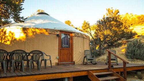 Luxury Glamping Yurt Resort Between National Parks with desert mountain views, close to hiking trails, slot canyons, off-roading and more!