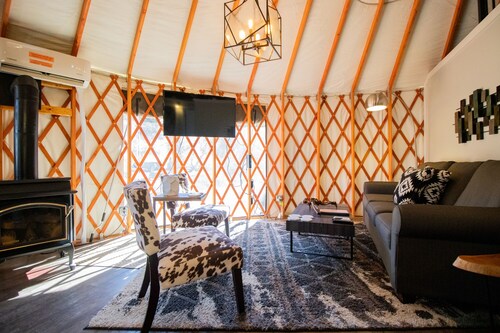 Luxury Glamping Yurt Resort Between National Parks with desert mountain views, close to hiking trails, slot canyons, off-roading and more!