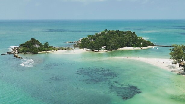 An aerial view of a tropical island with clear turquoise waters and a small sandy beach. - Luxury private 3 Ultra-King BR, with staff, villa sea view 10min walk to beach (Surat Thani)