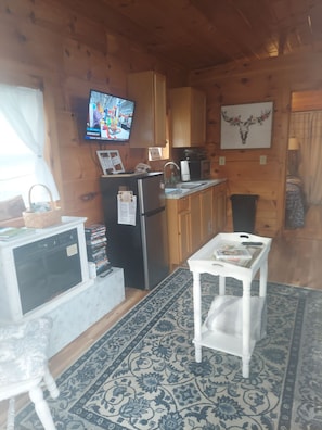 Fridge, microwave, coffee/tea maker, dining tables