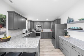 Fridge, microwave, oven, stovetop - Hem's Hideout | 5BR Tropical Oasis w/ Heated Pool (North Myrtle Beach)