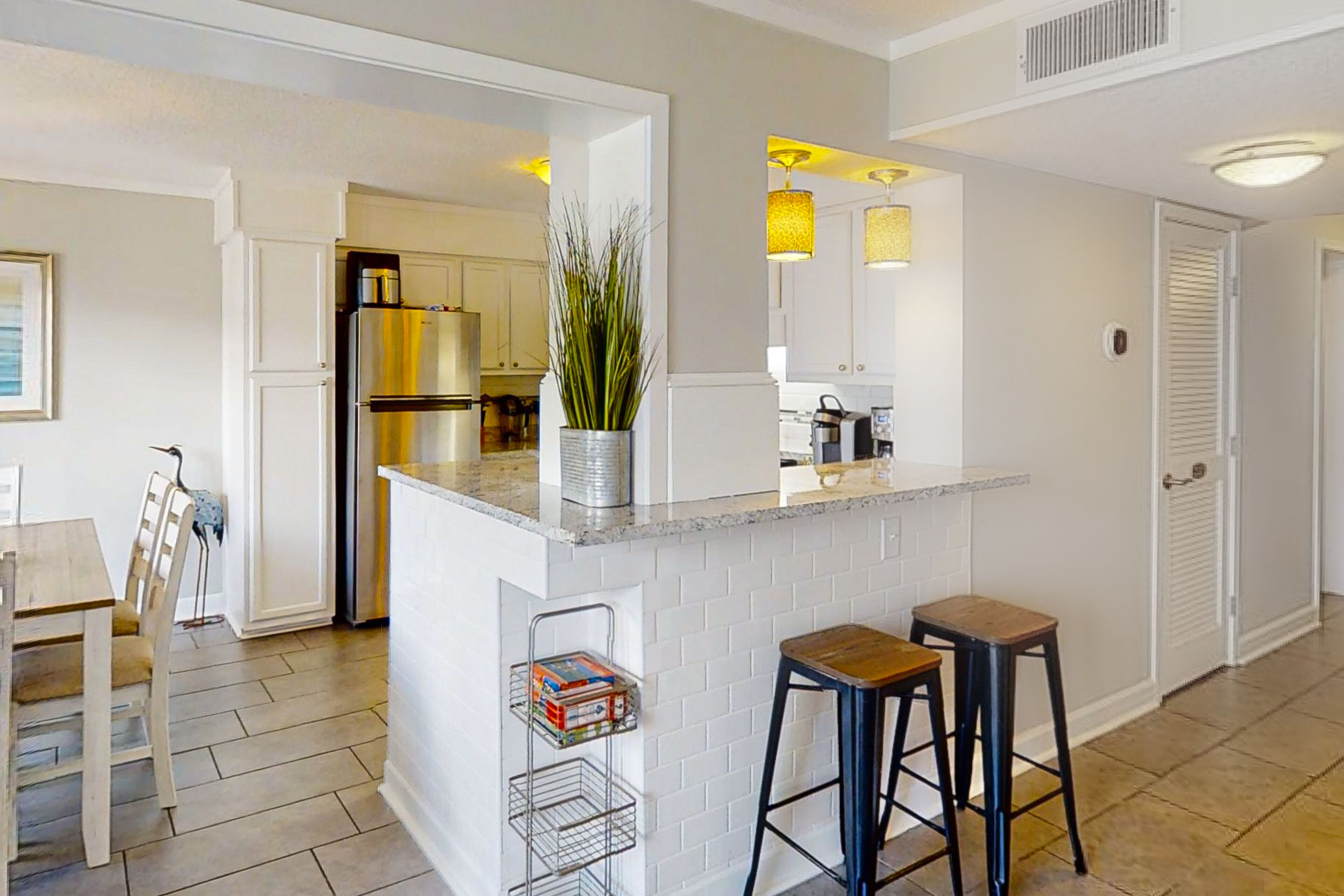 Modern condo in oceanfront building with pools, hot tubs, arcade, & beach access