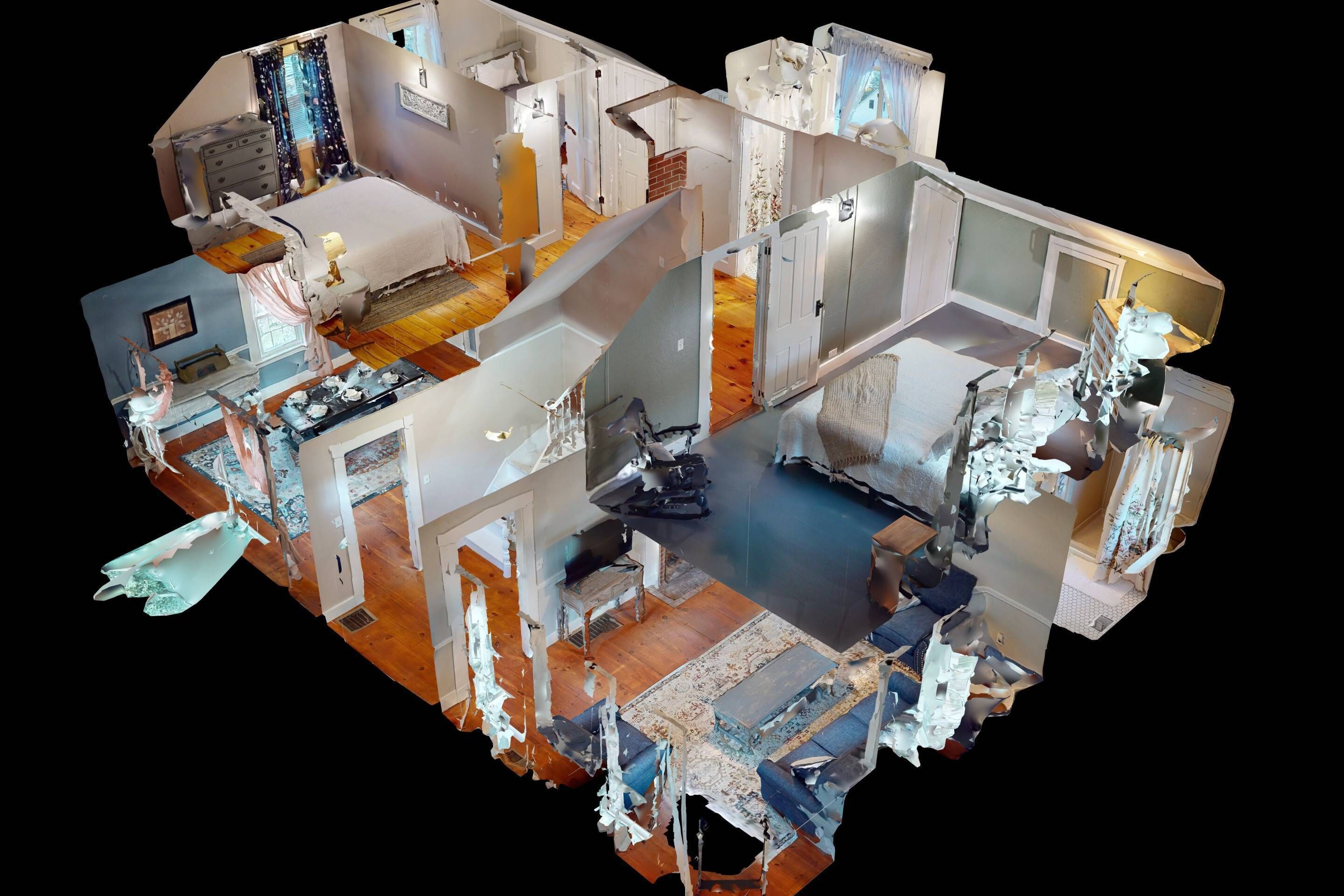 Ein 3D-Modell eines Hotelzimmers mit Bett, Schminktisch und kleinem Tisch.