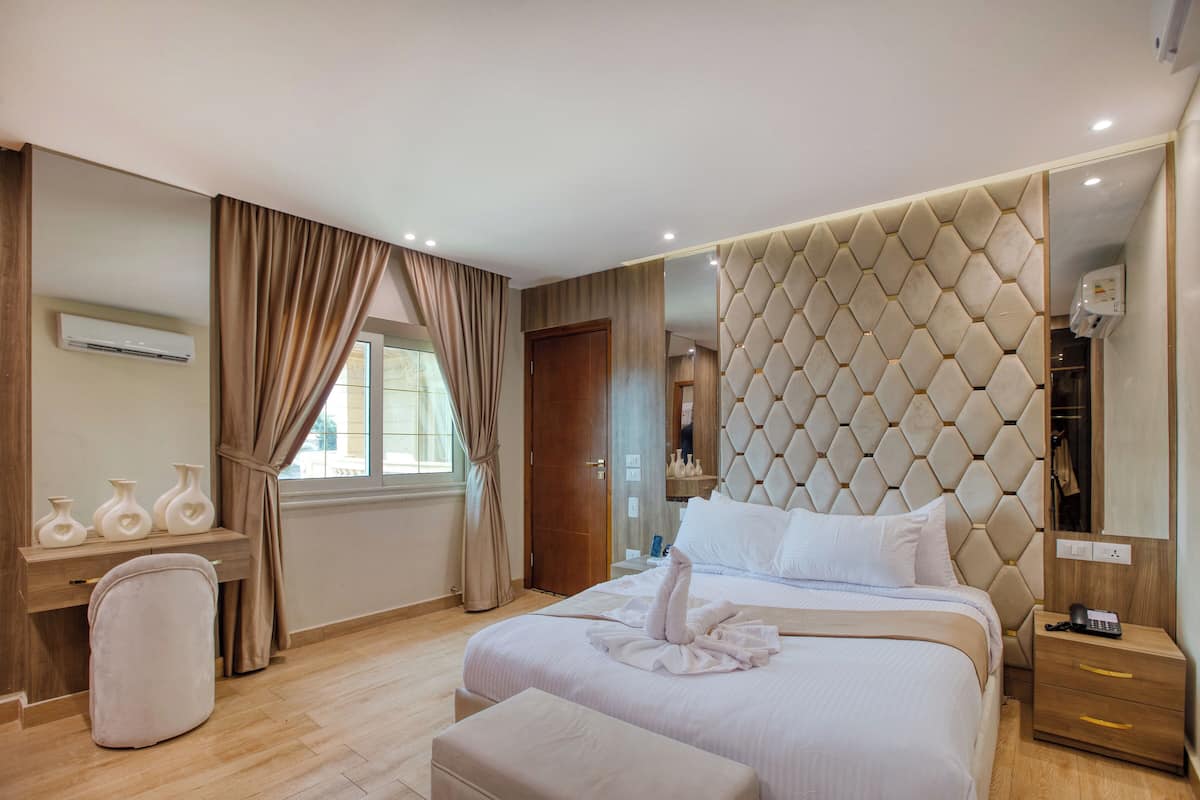 Premium bedding, down comforters, memory foam beds, minibar