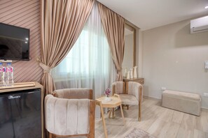 Premium bedding, down comforters, memory foam beds, minibar