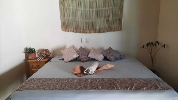 Basic Room, 1 Bedroom, Ground Floor | Down comforters, individually decorated, individually furnished