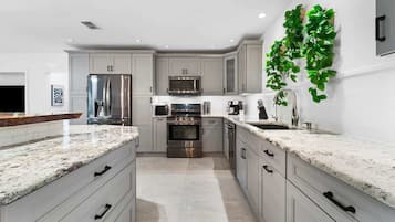 Microwave, oven, electric kettle, high chair