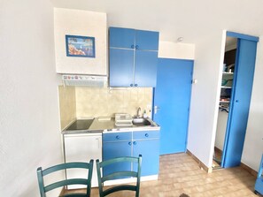 Fridge, microwave, cookware/dishes/utensils