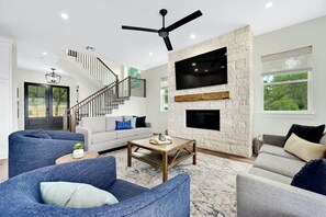 Smart TV, fireplace, books