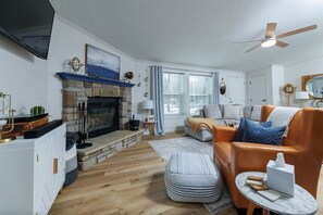 Smart TV, fireplace, DVD player, books