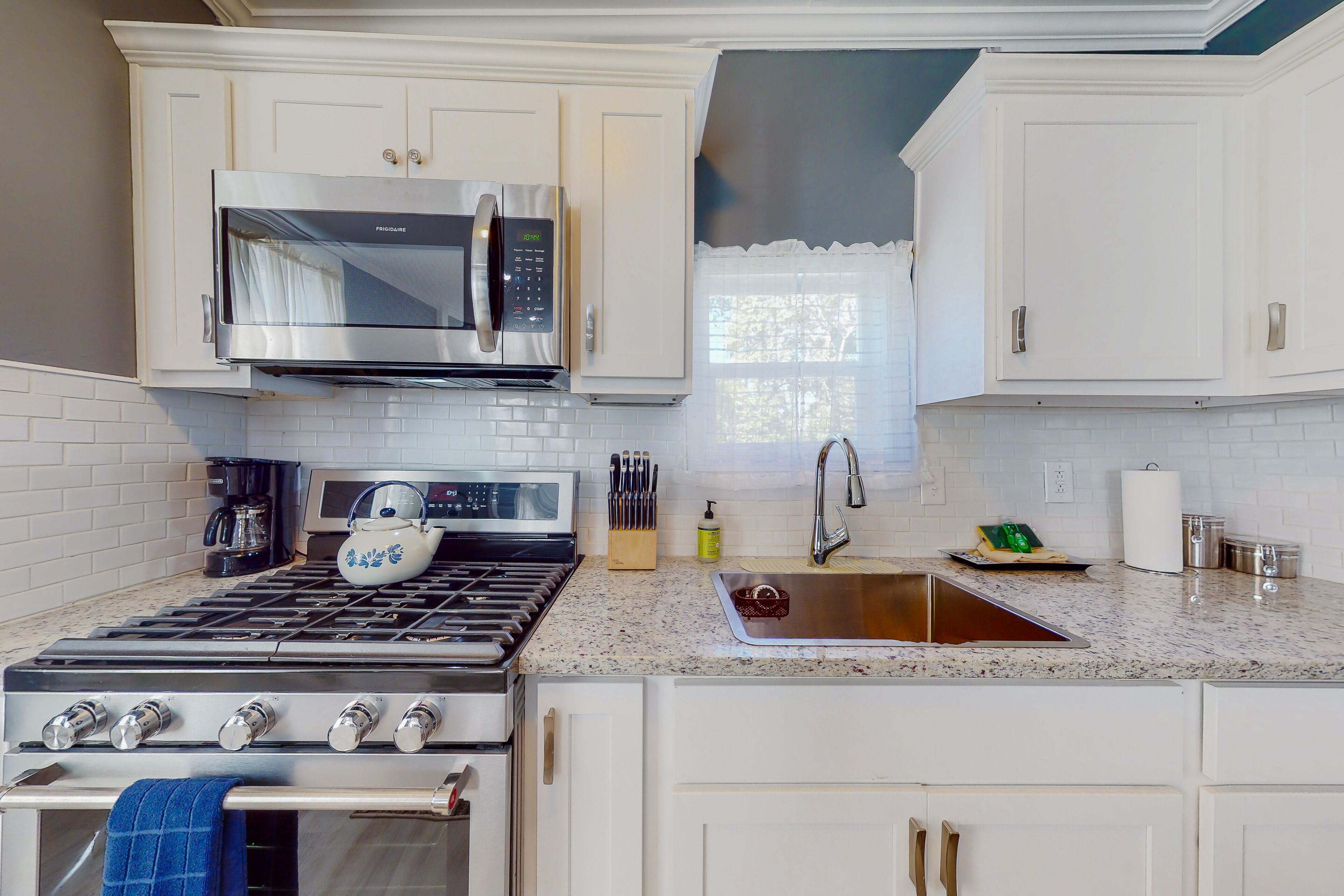 Updated home near downtown with W/D & central AC - easy drive to beach