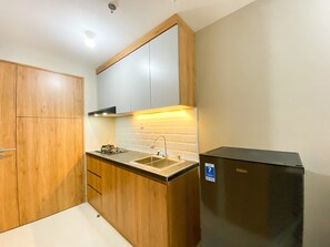 Apartment | Private kitchen - Minimalist Studio Room LRT City Jatibening Apartment (Bekasi)