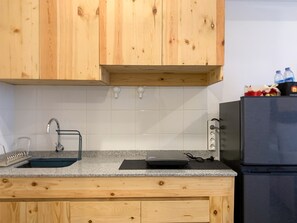Apartment | Private kitchen | Full-size fridge, stovetop
