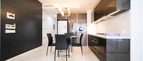 Apartment, 2 Bedrooms | Private kitchen | Full-size fridge, stovetop