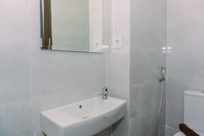 Bathroom - Good Deal And Homey Studio Pacific Garden Apartment (Tangerang)