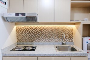 Private kitchen - Homey And Cozy 2Br Apartment At Tamansari La Grande (Bandung)