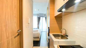 Apartment | Private kitchen | Full-size fridge, stovetop