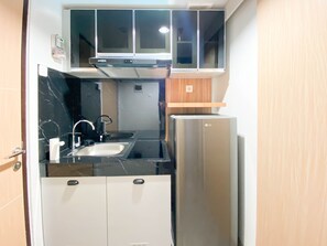 Appartement, 1 chambre | Cuisine privée | Réfrigérateur grande capacité avec congélateur, surface de cuisson