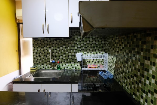 Apartment, 2 Bedrooms | Private kitchen | Full-size fridge, stovetop